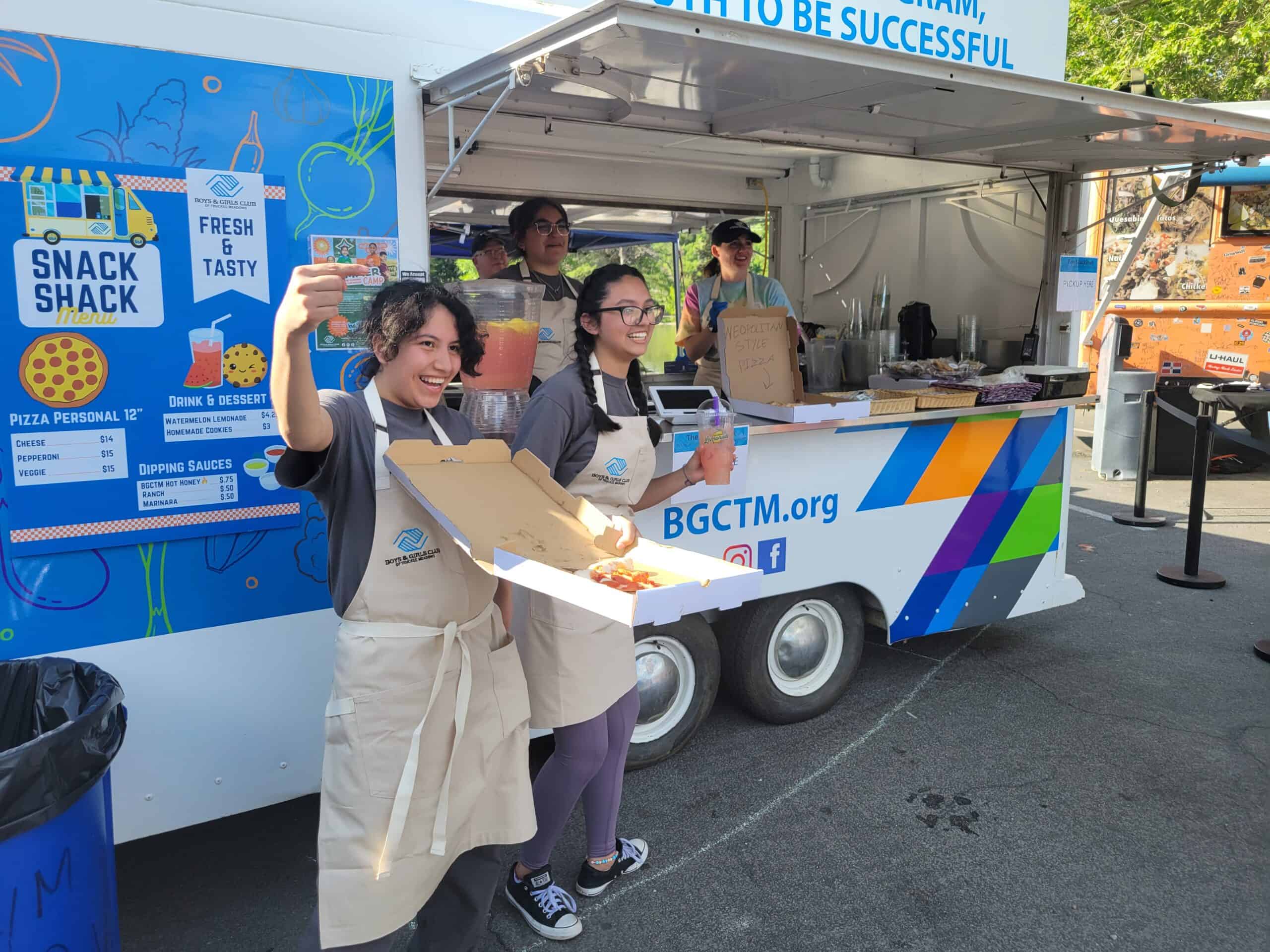 BGCTM food truck teen preparing pizza